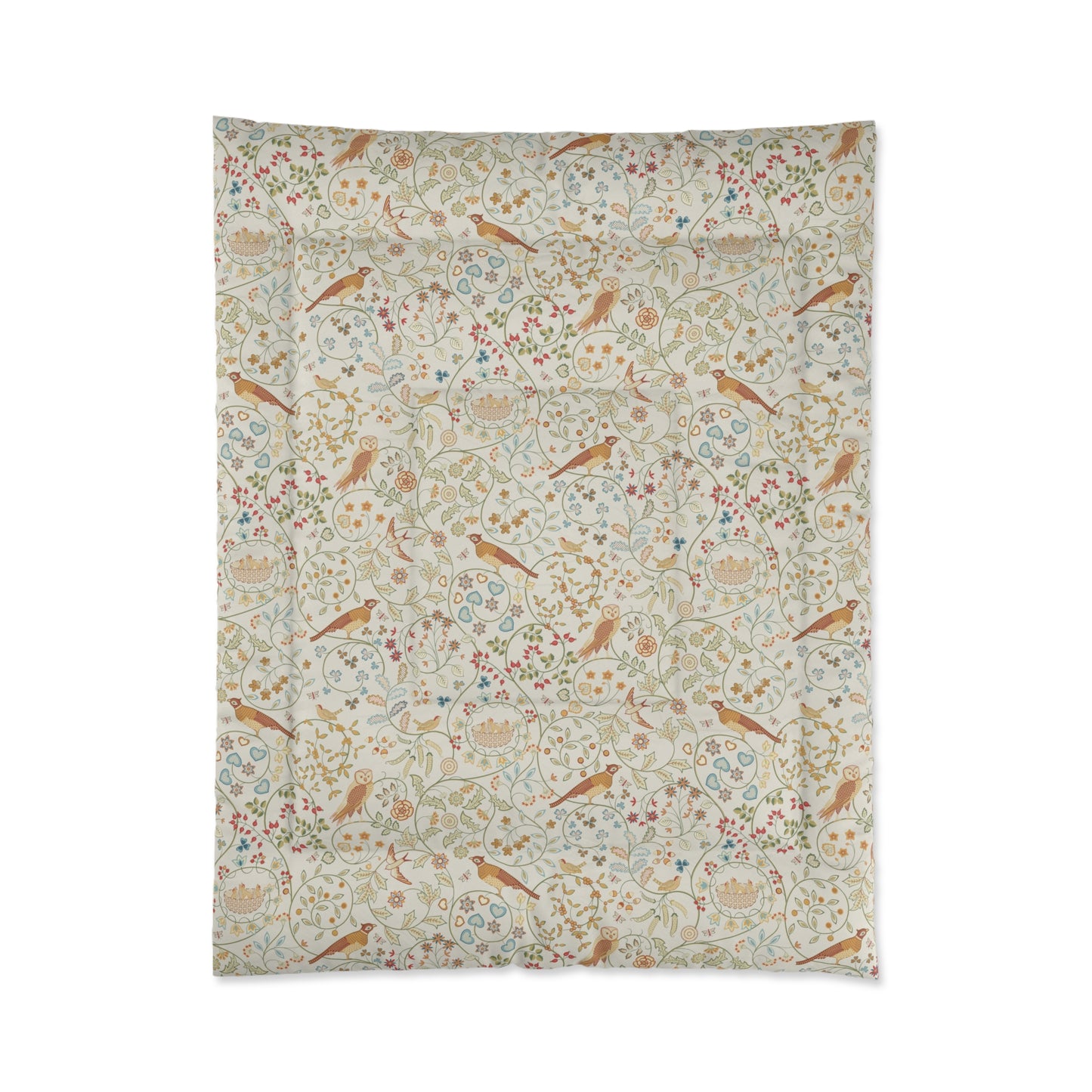 Floral and bird patterned fabric on a white background