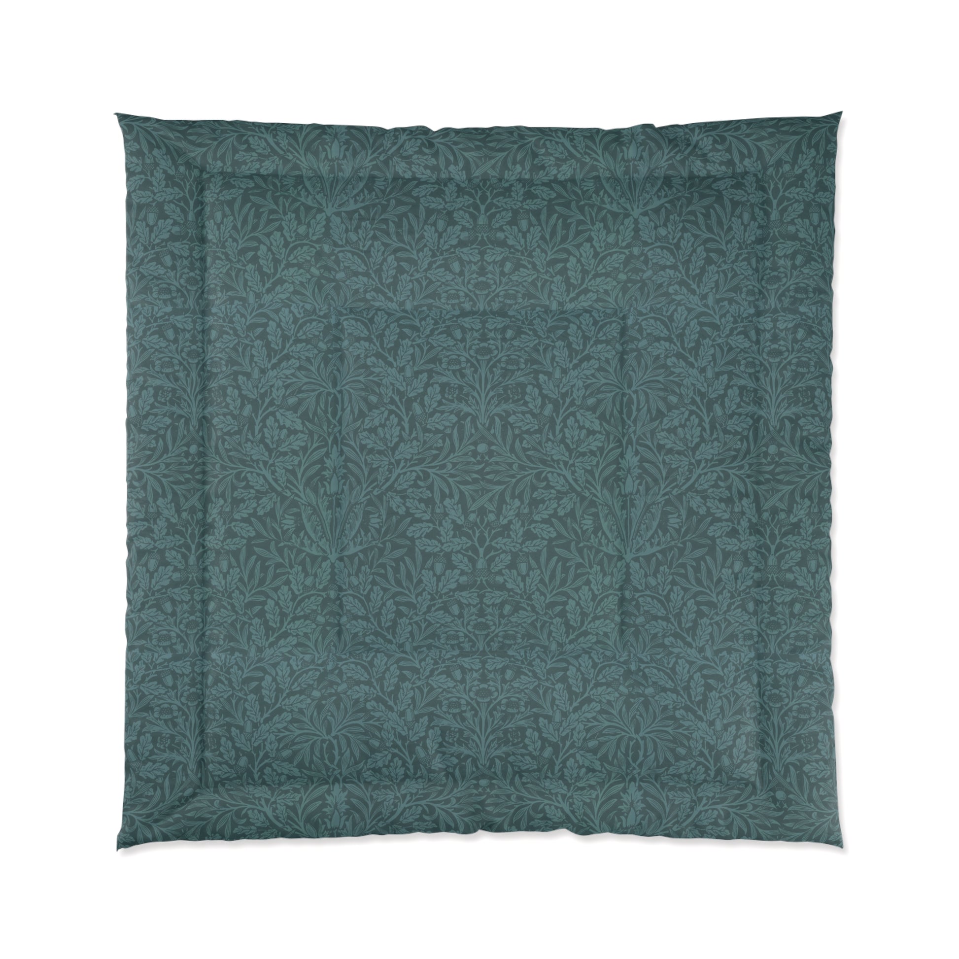 A folded green comforter with a geometric pattern inspired by William Morris - Acorns & Oak Leaves Collection.