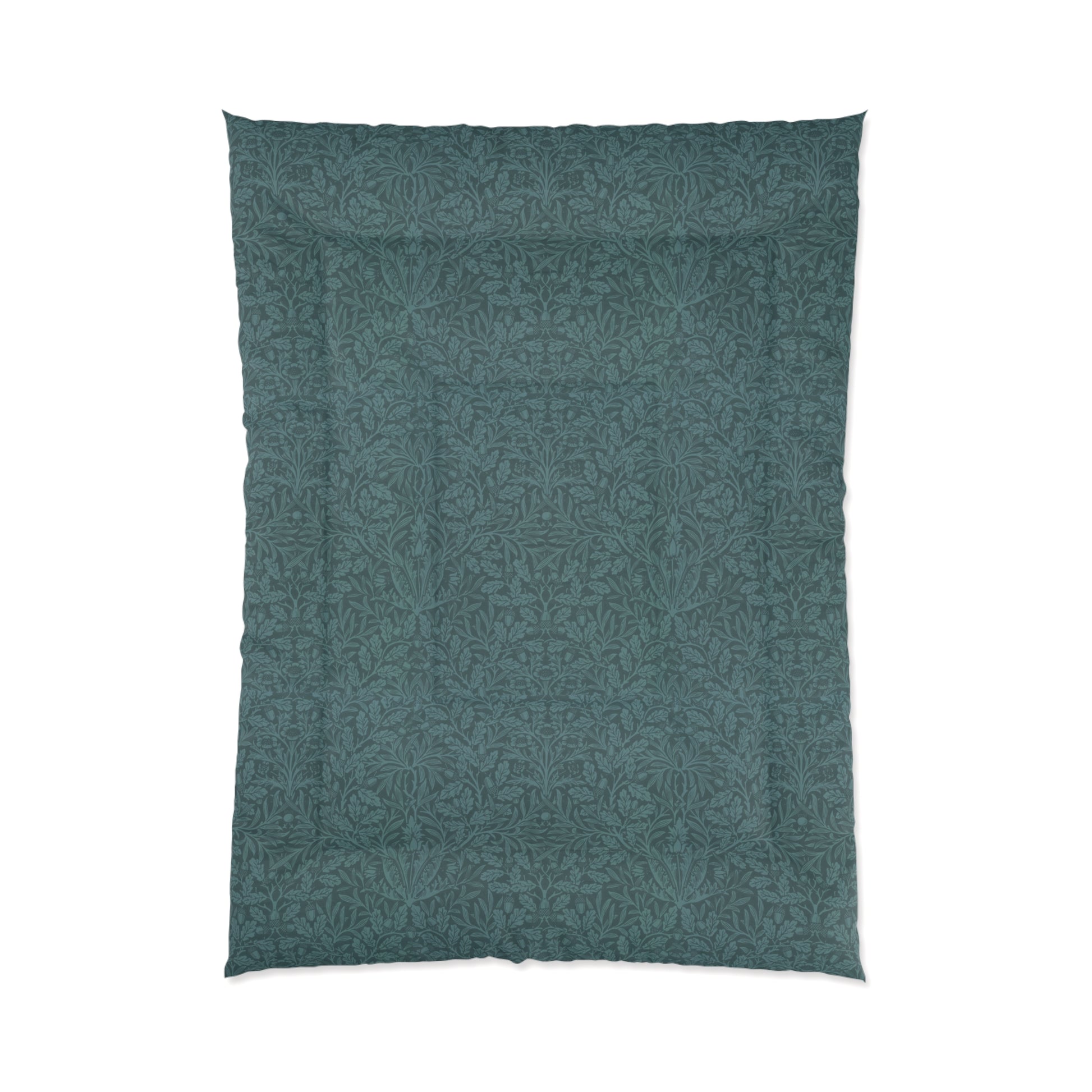 A folded green comforter with a geometric pattern inspired by William Morris - Acorns & Oak Leaves Collection.