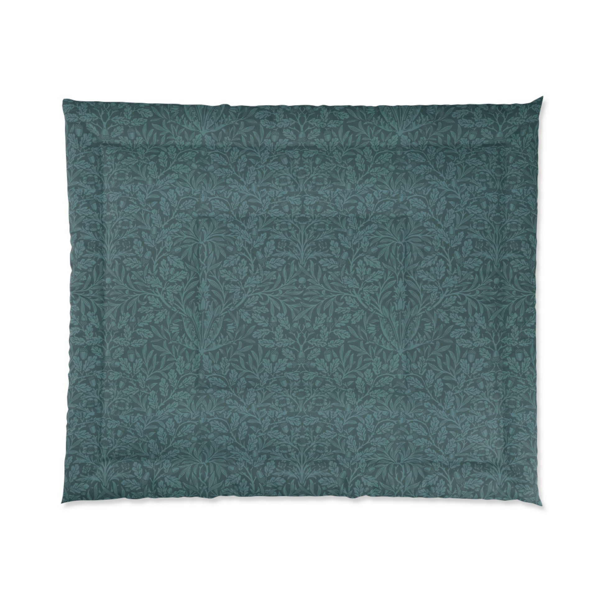 A folded green comforter with a geometric pattern inspired by William Morris - Acorns & Oak Leaves Collection.
