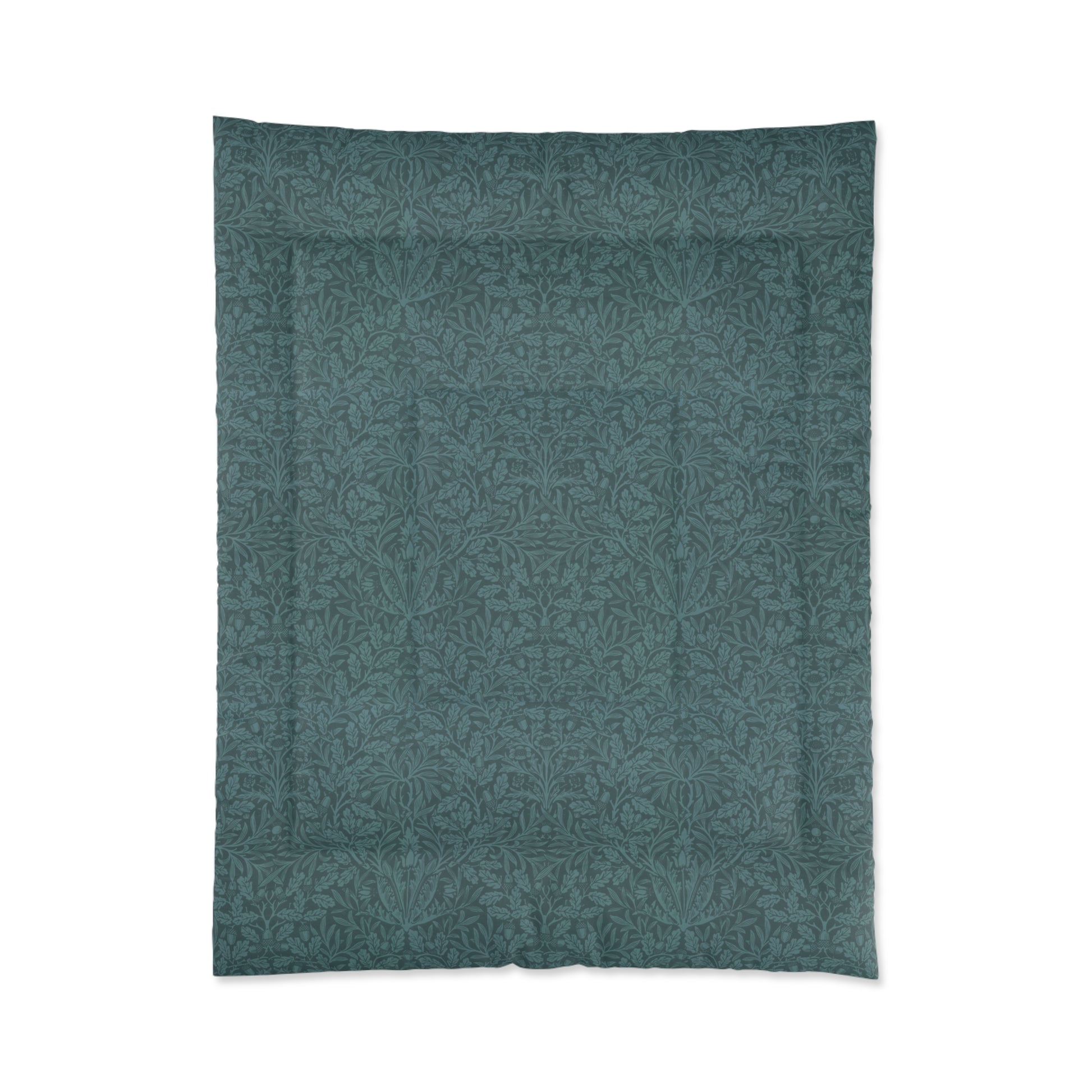 A folded green comforter with a geometric pattern inspired by William Morris - Acorns & Oak Leaves Collection.