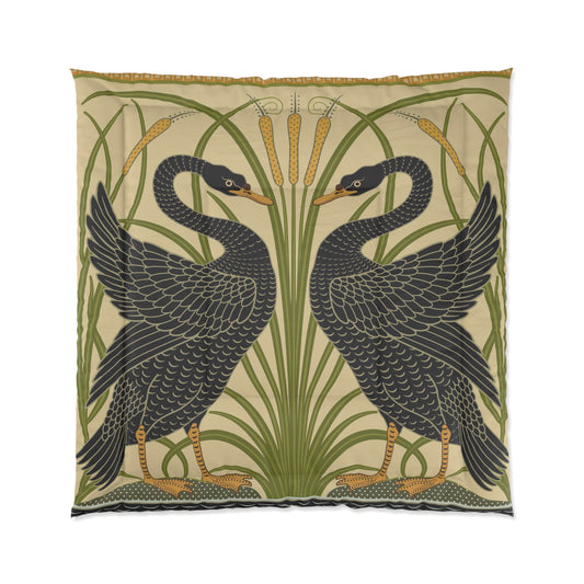 A comforter featuring a double square quilting pattern with a one-sided print of black swans on a beige background.