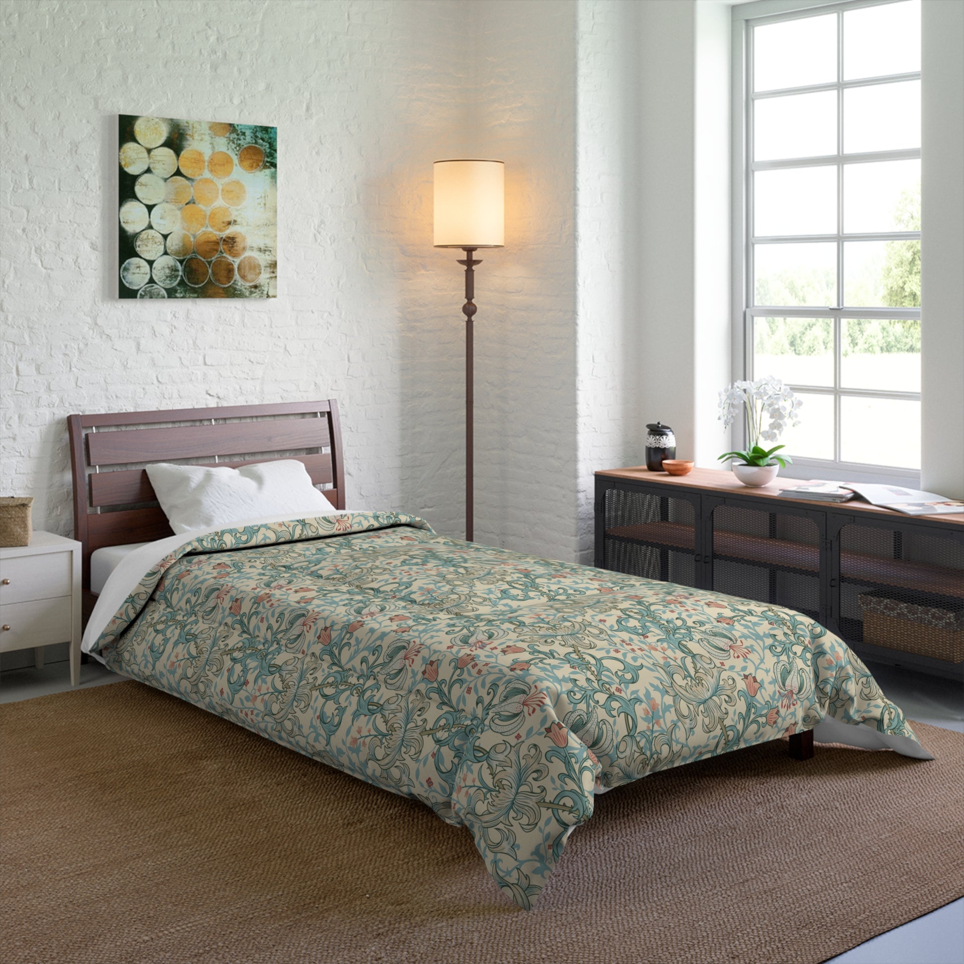 A comforter with a floral pattern in shades of blue, gray, and white, inspired by William Morris - Golden Lily Collection.