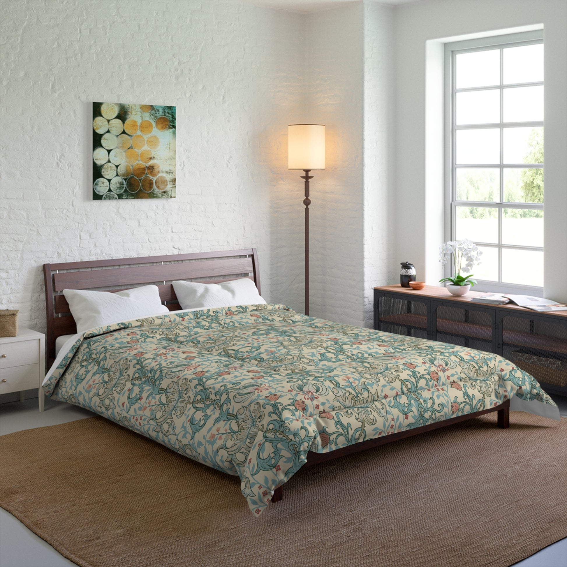 A comforter with a floral pattern in shades of blue, gray, and white, inspired by William Morris - Golden Lily Collection.