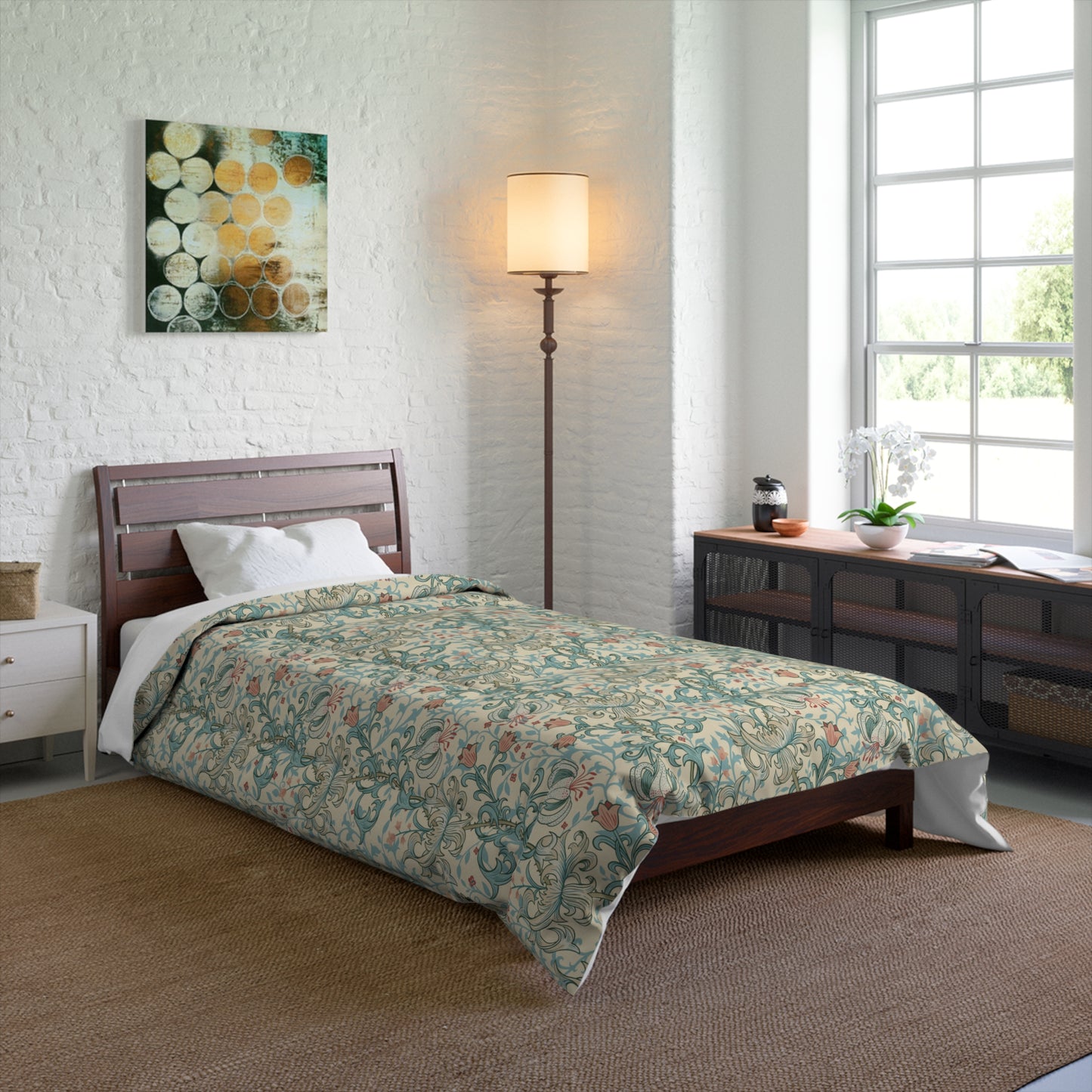 A comforter with a floral pattern in shades of blue, gray, and white, inspired by William Morris - Golden Lily Collection.