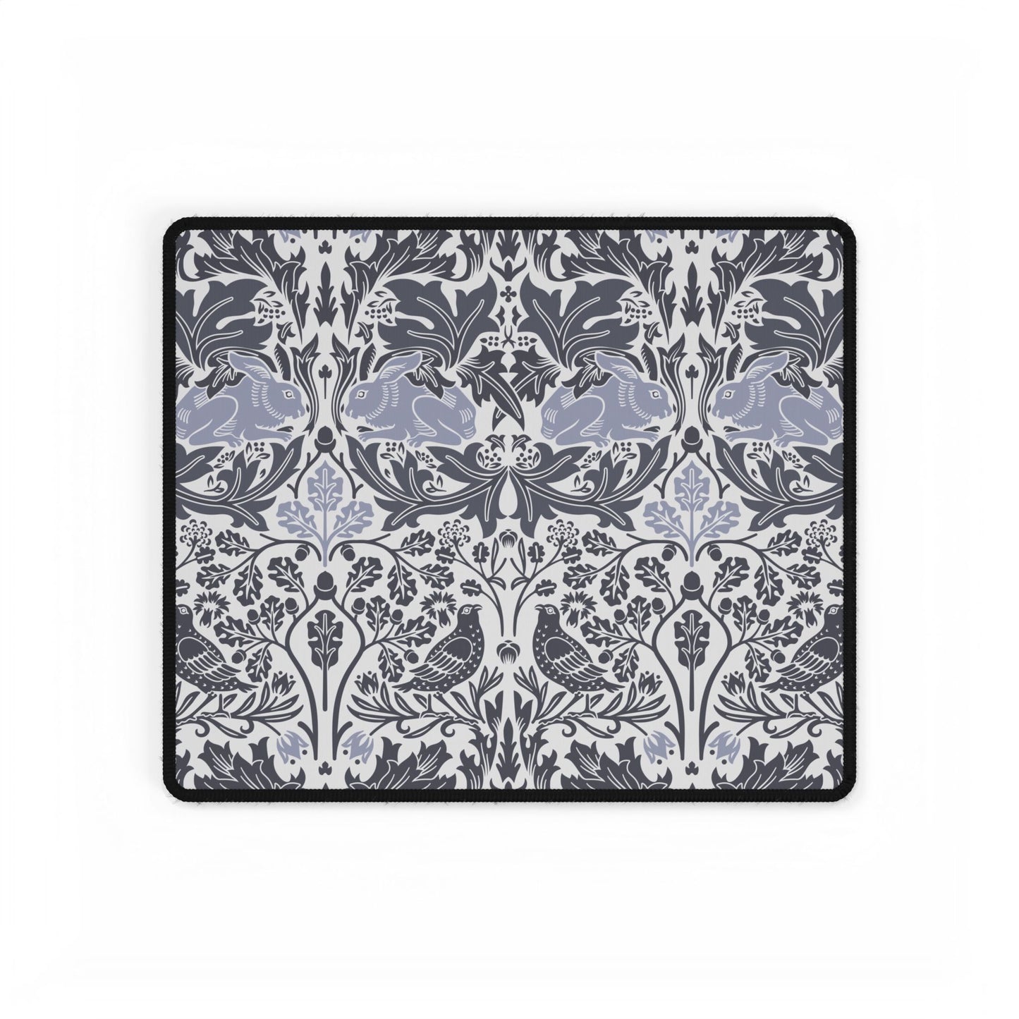 Decorative blanket with a floral and animal pattern on a white background