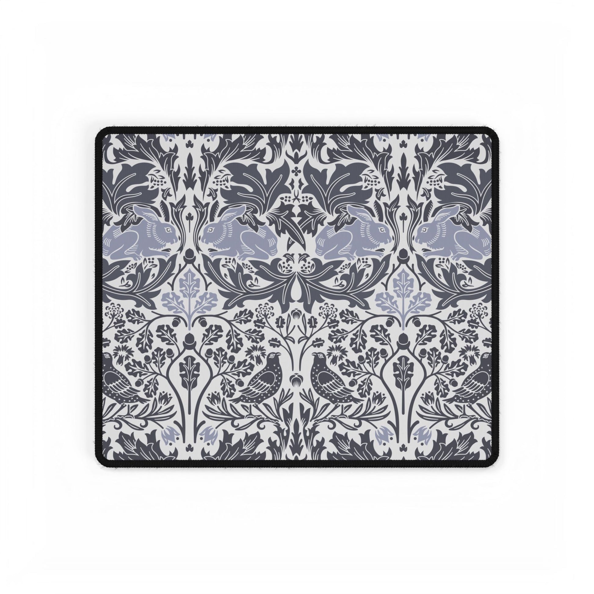 Decorative blanket with a floral and animal pattern on a white background