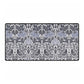 Decorative mat with a floral and bird pattern on a white background