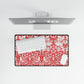 Floral patterned desk mat with keyboard on a white surface