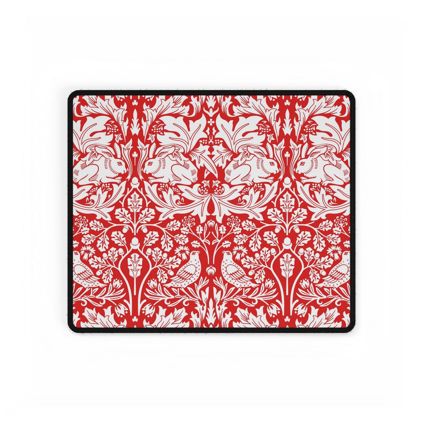 Red and white floral and bird pattern on a black border