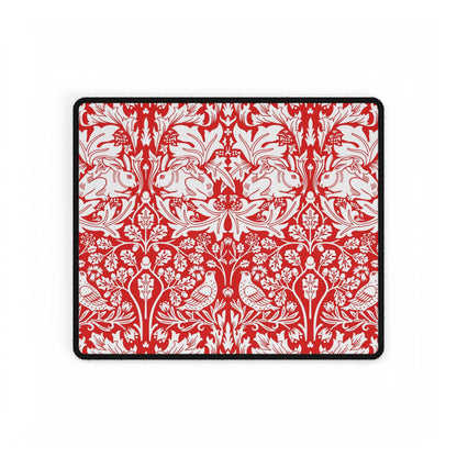 Red and white floral and bird pattern on a black border
