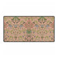 Floral patterned rug with green and blue flowers on a pink background
