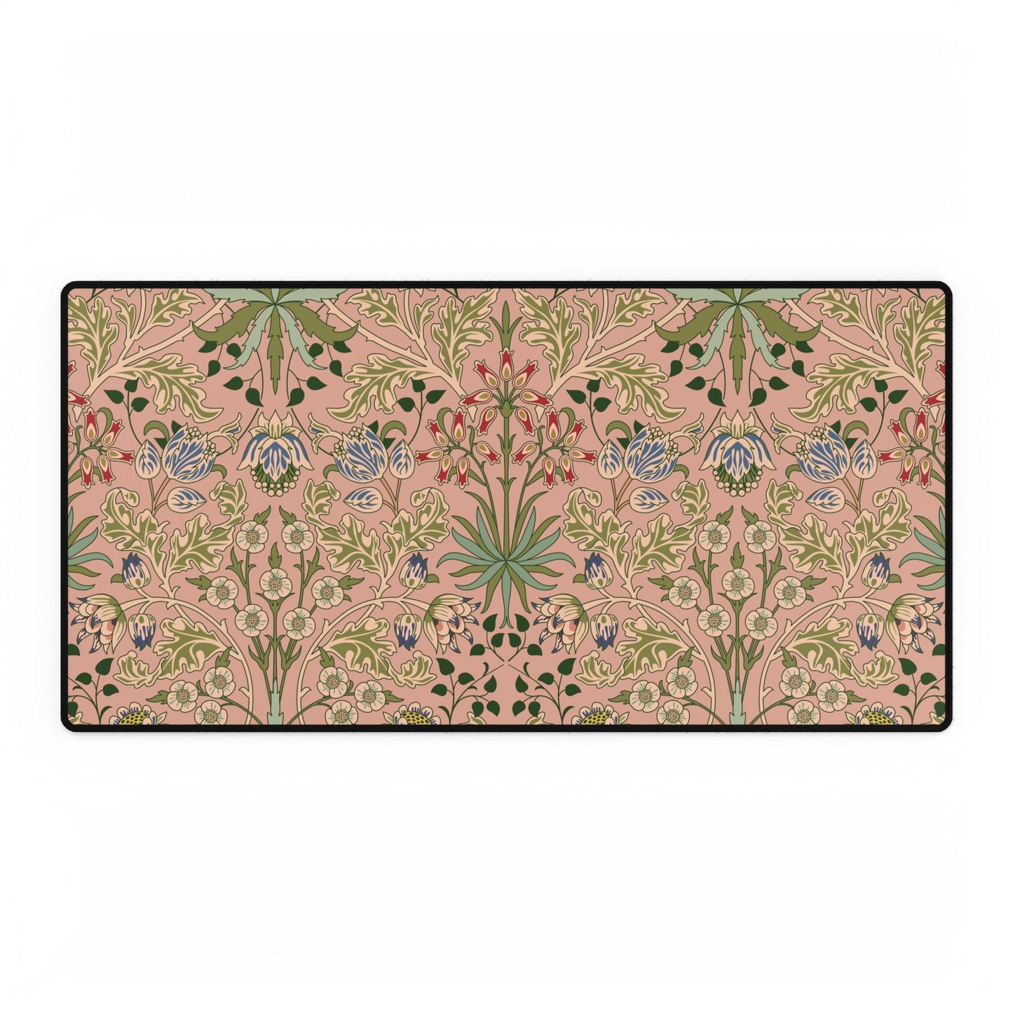 Floral patterned rug with green and blue flowers on a pink background