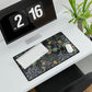 Decorative desk mat with nature design on a desk with computer and plants