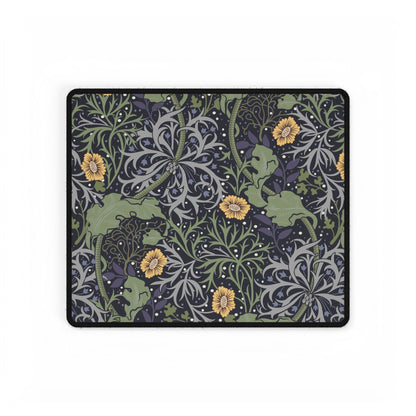 Decorative mouse pad with nature-themed design featuring green leaves, gray patterns, and yellow flowers on a black background.