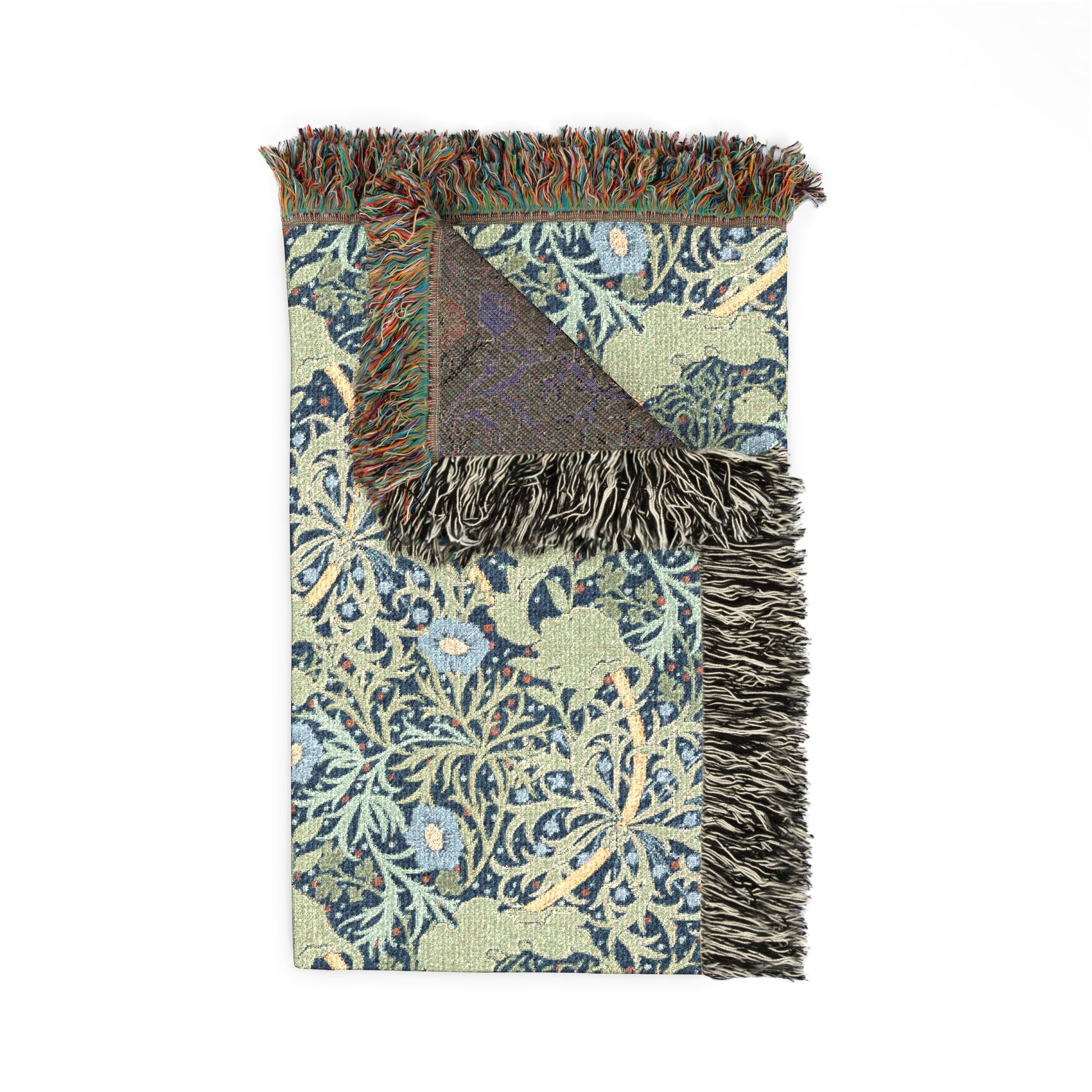 Floral patterned throw blanket with fringes on a white background