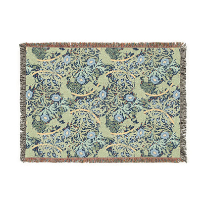 Decorative blanket with floral and bird pattern on a white background