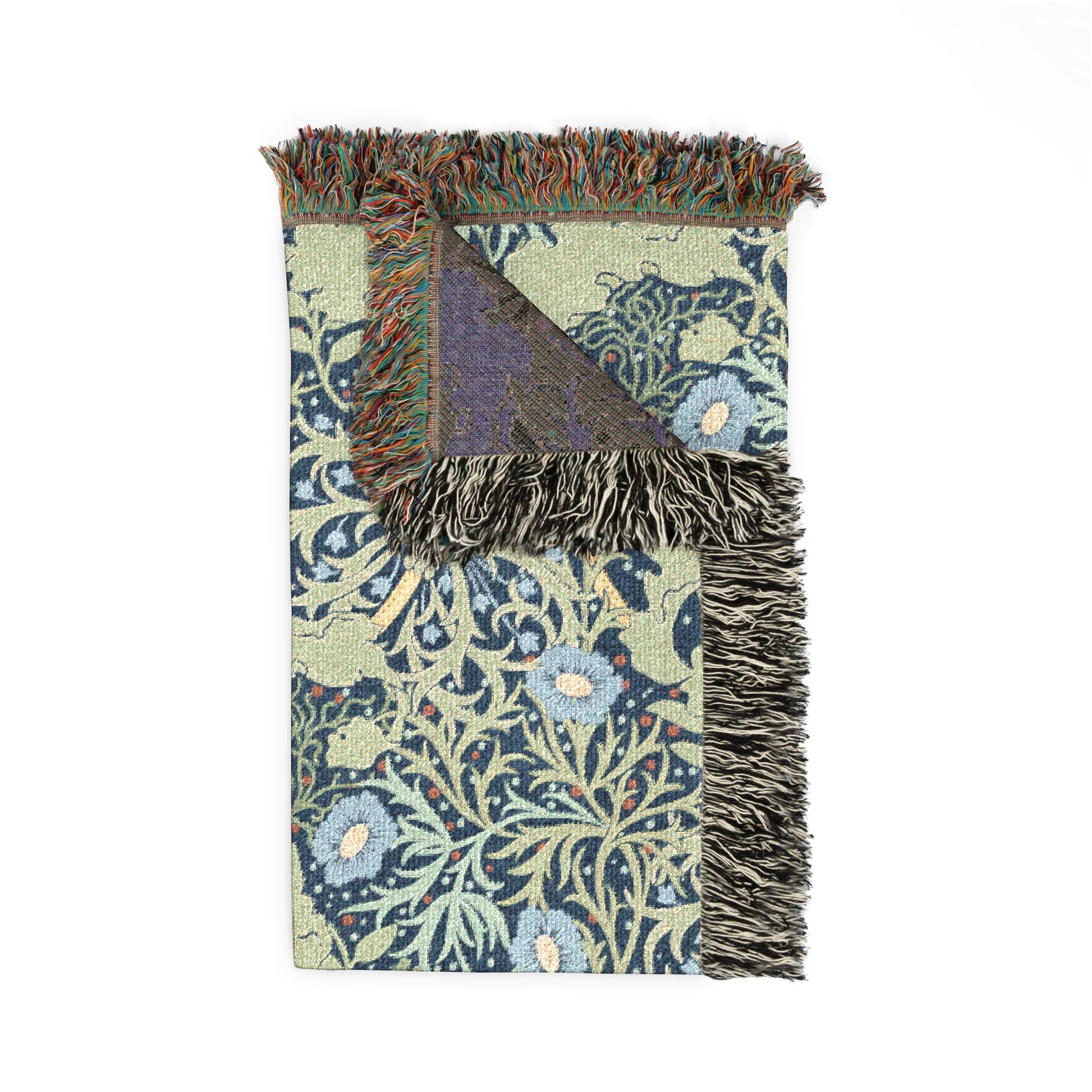 Decorative blanket with floral pattern and fringed edge on a white background