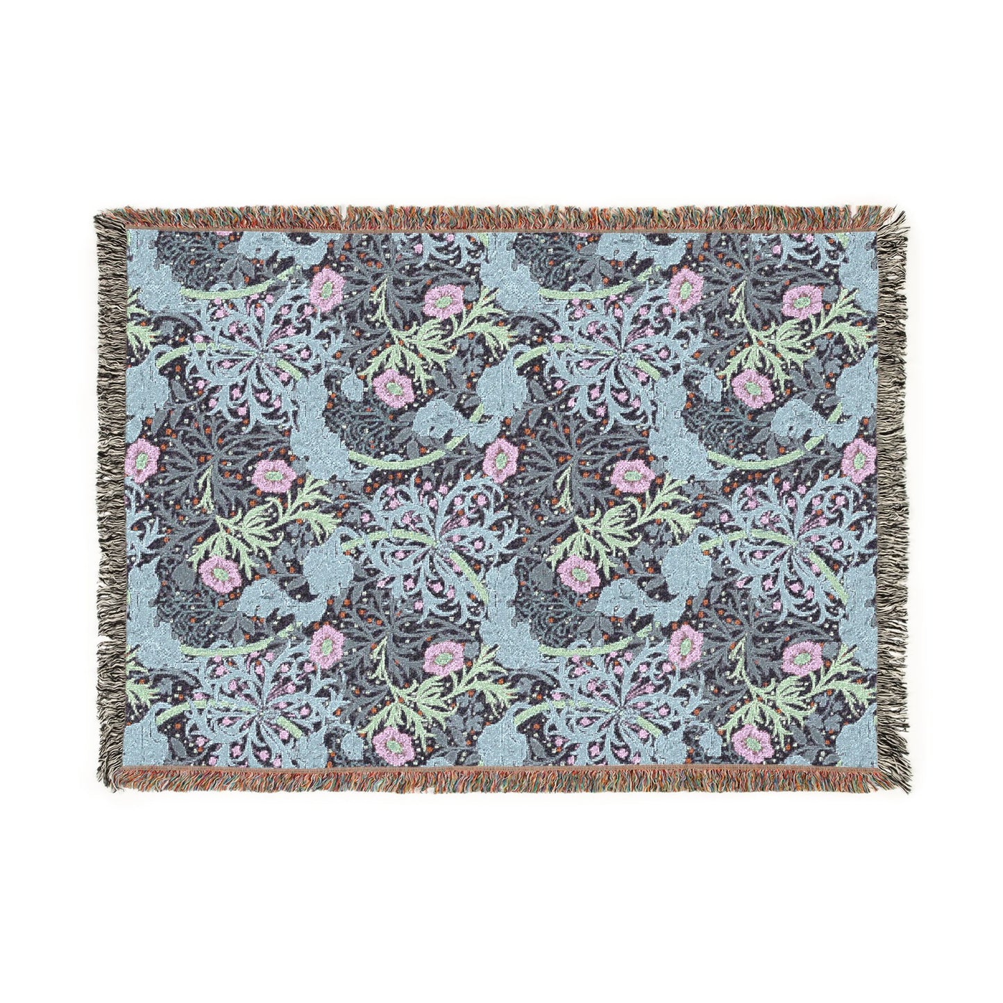 Floral patterned throw blanket with pink flowers and green leaves on a blue background