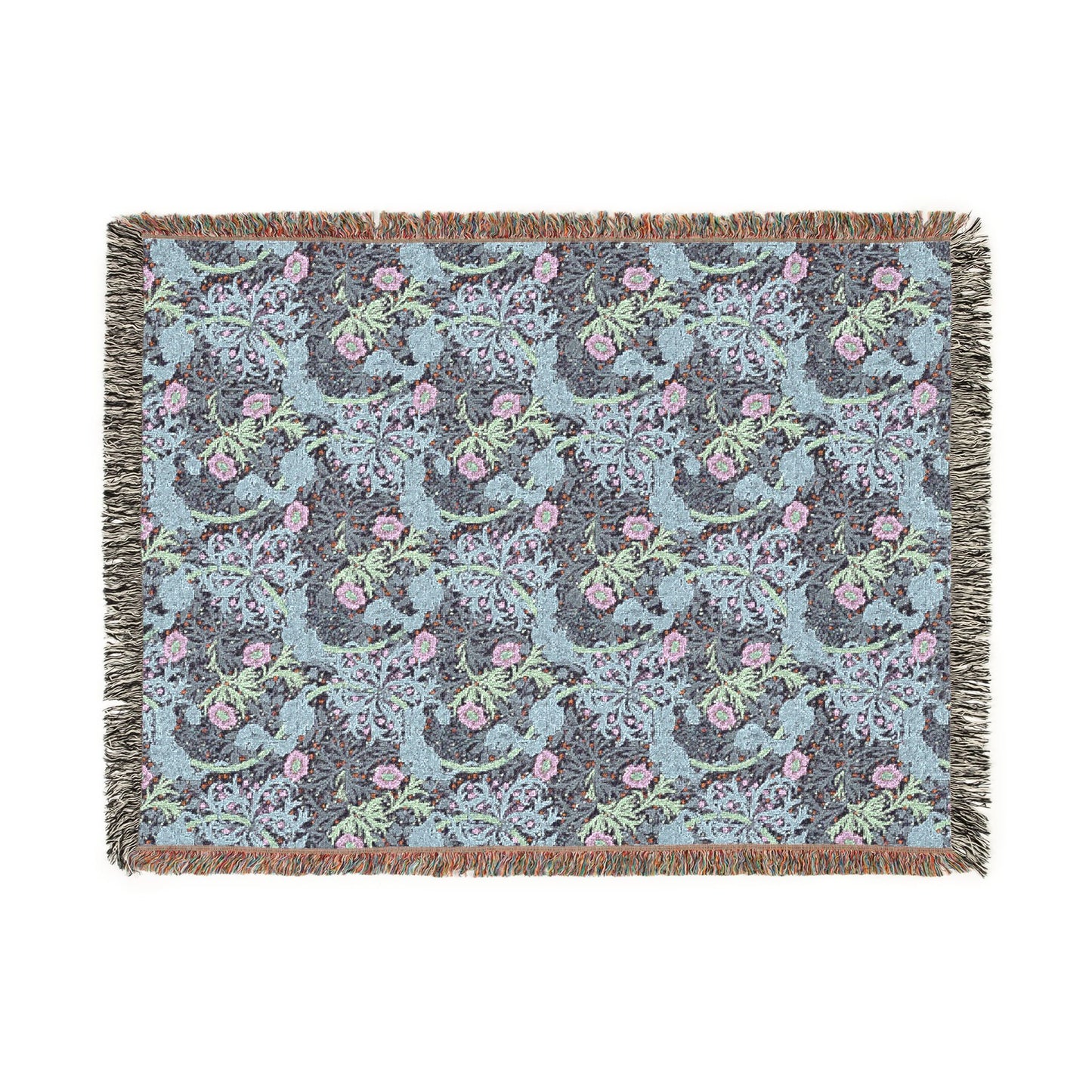 Floral patterned throw blanket with fringe on a white background