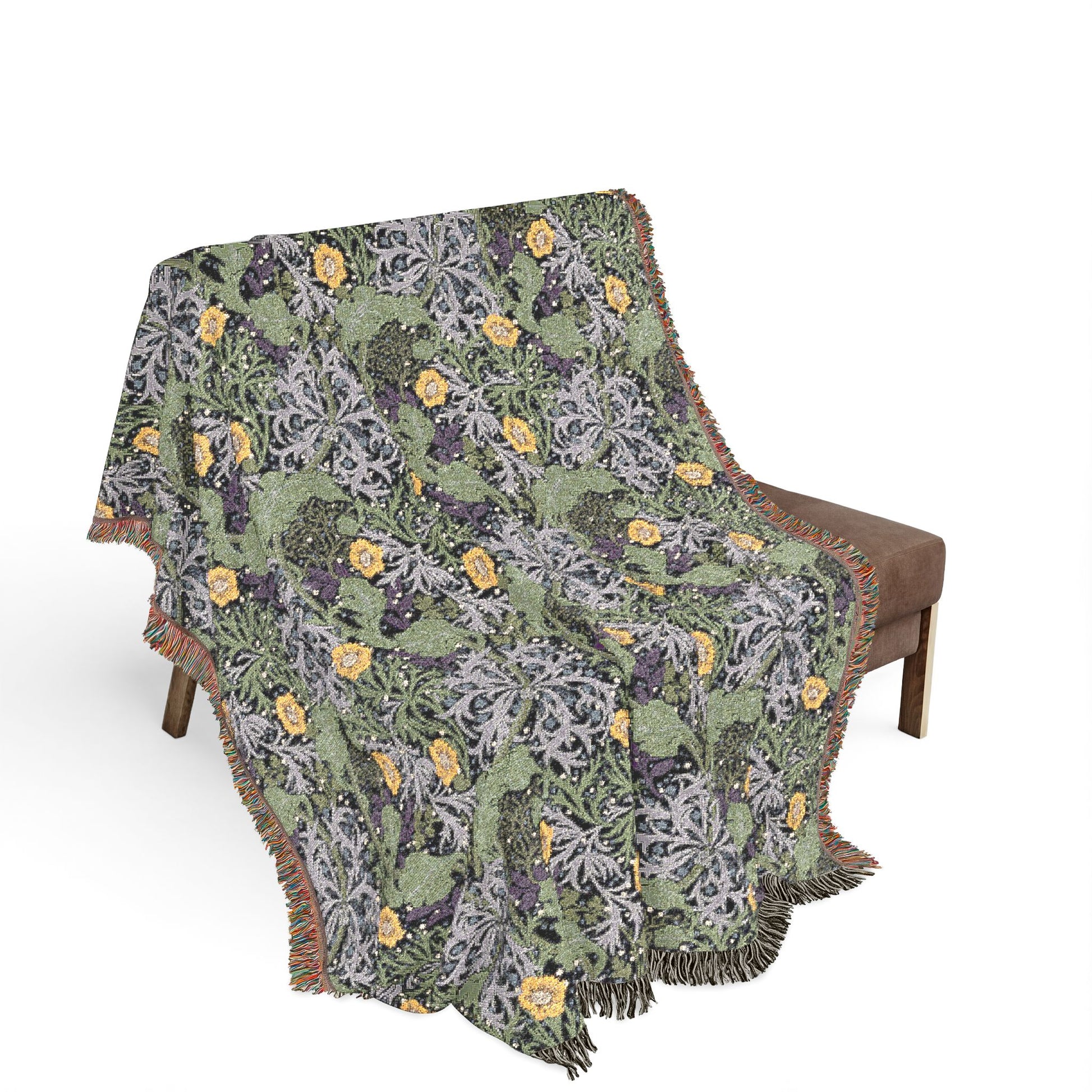 Patterned blanket draped over a chair on a white background
