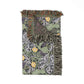 Woven blanket with floral pattern and fringed edge on a white background