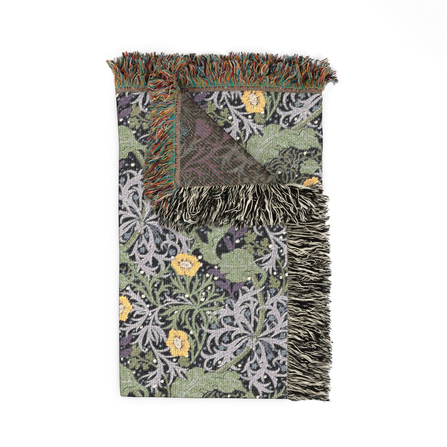 Woven blanket with floral pattern and fringed edge on a white background