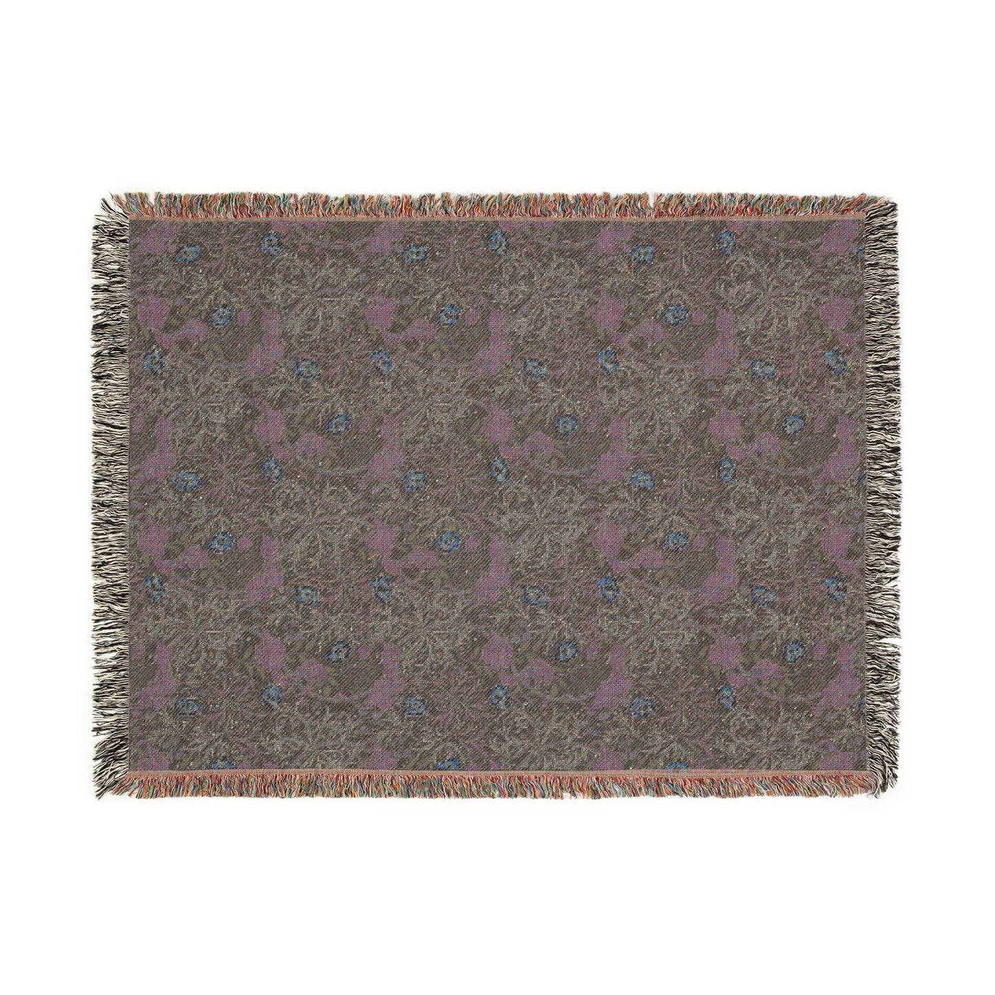 Woven blanket with floral pattern on a plain background