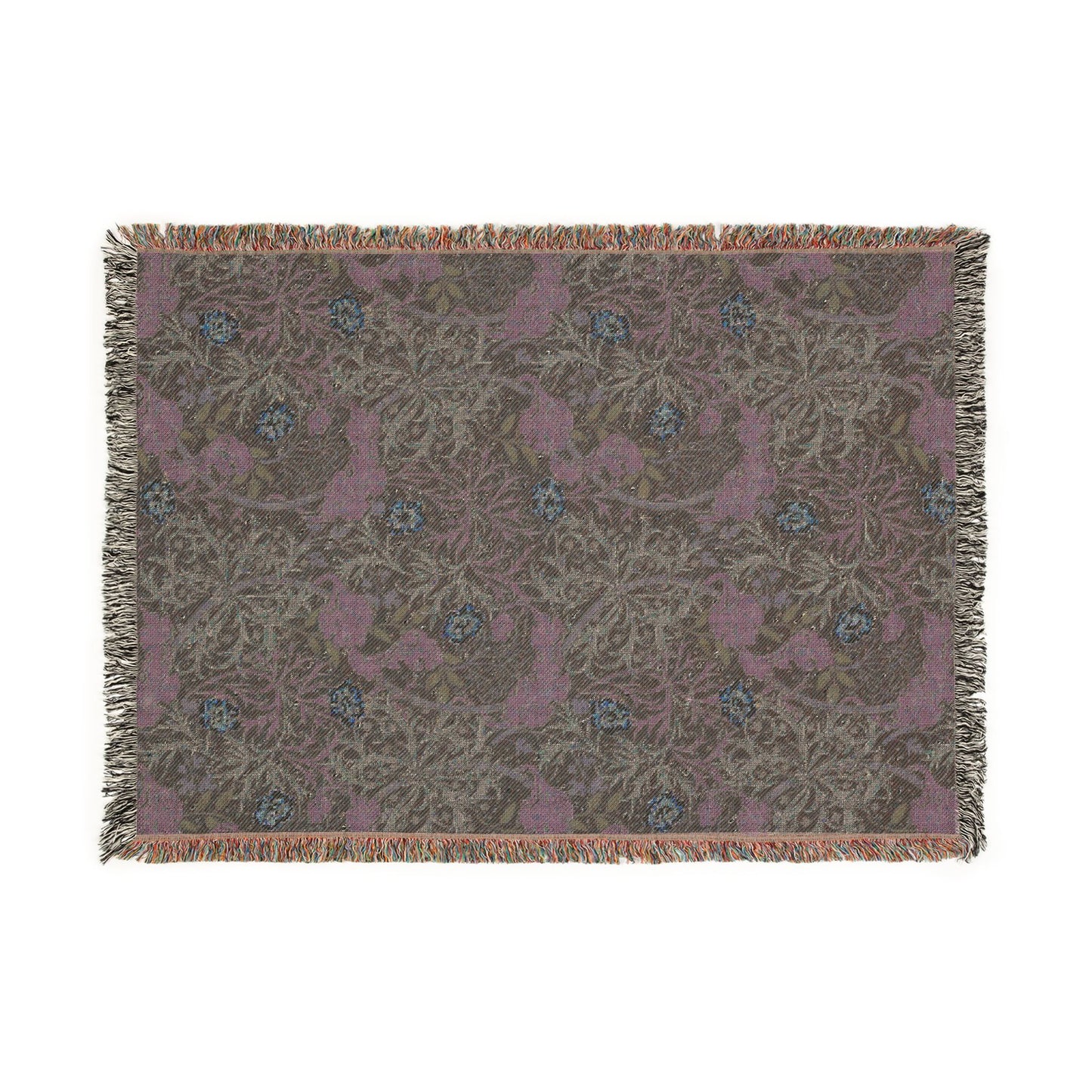 Floral patterned throw blanket with fringe on a white background