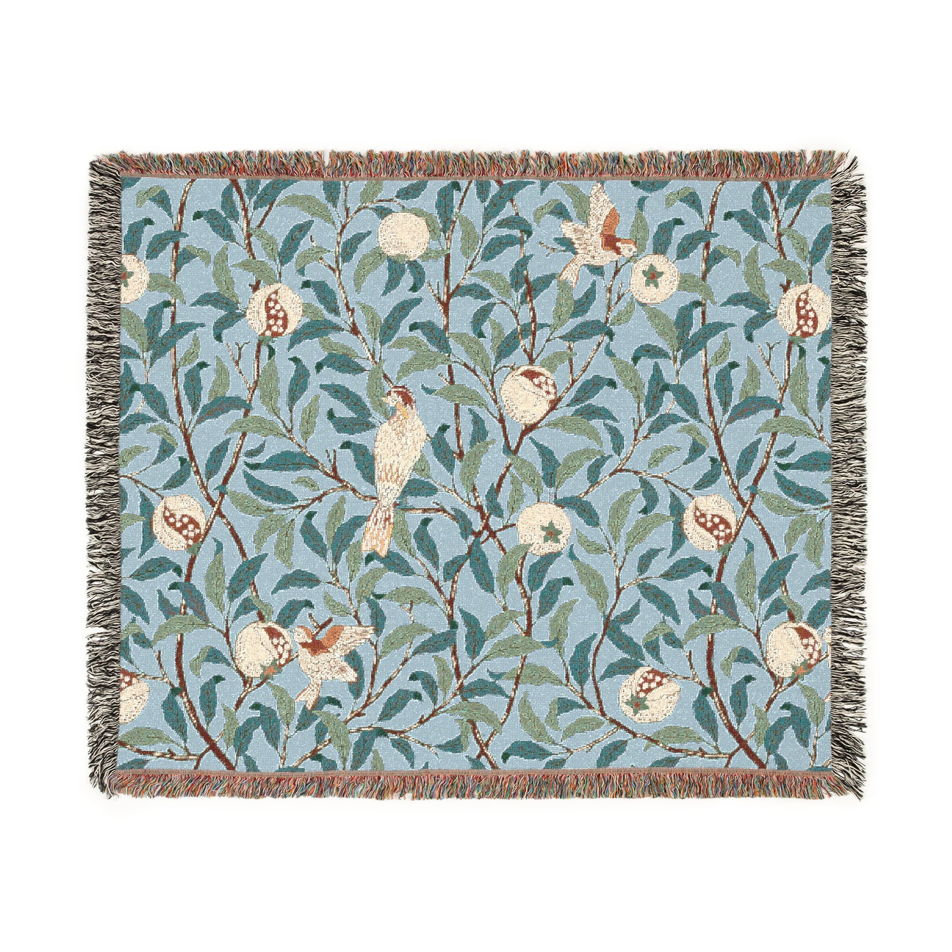 A woven cotton blanket with a bird and pomegranate pattern in Tiffany Blue color, featuring a fringe edge.