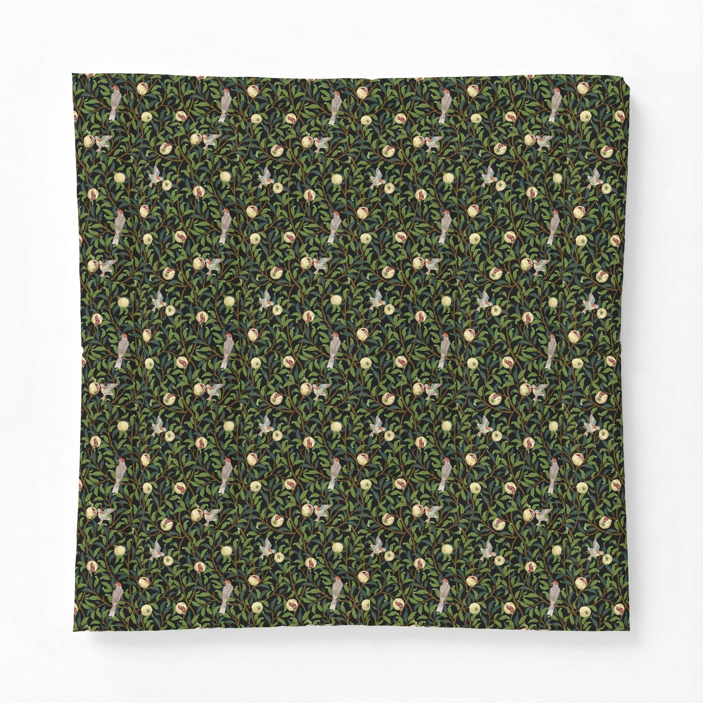 Patterned fabric with small animal and floral design on a green background