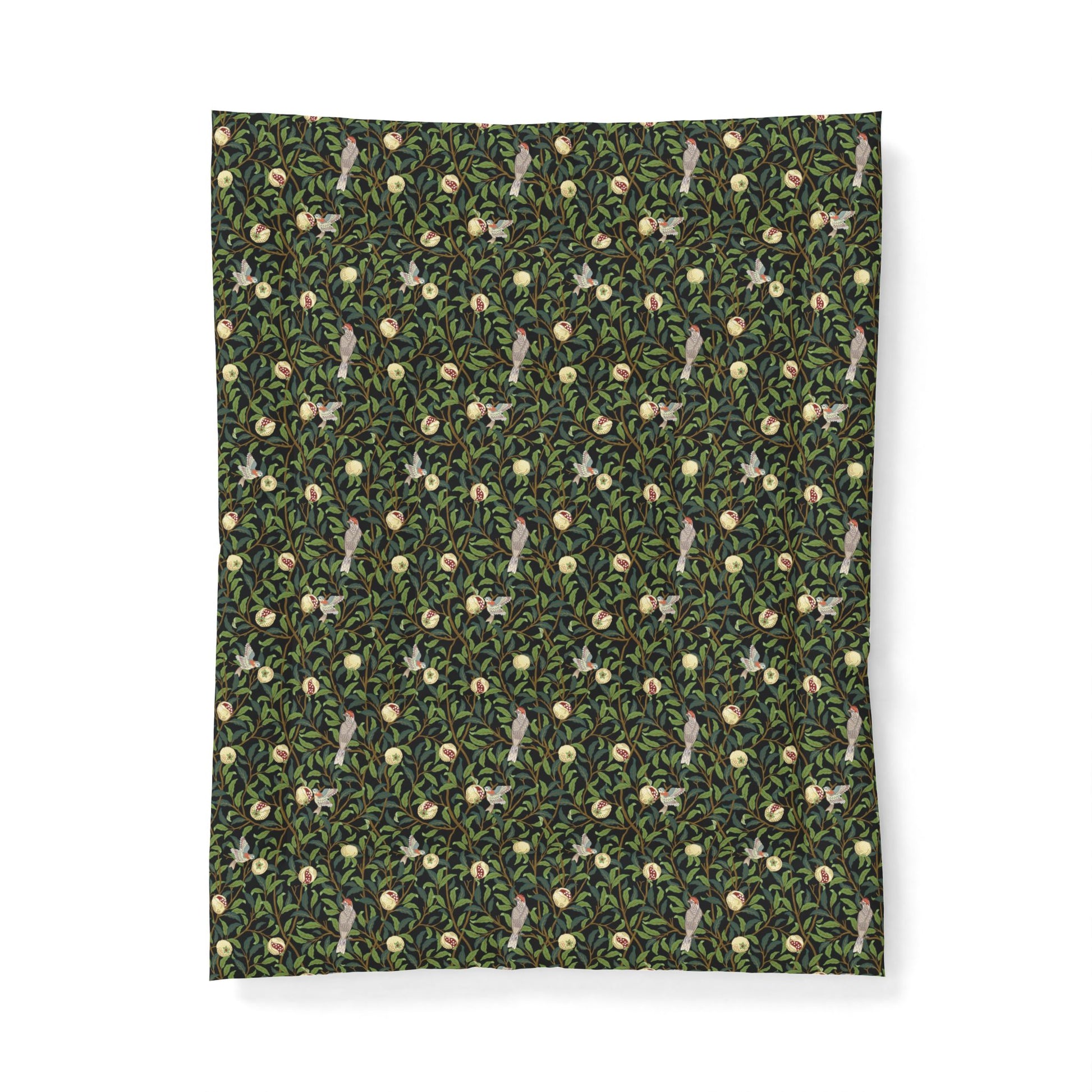 Patterned fabric with small animal and plant design on a green background