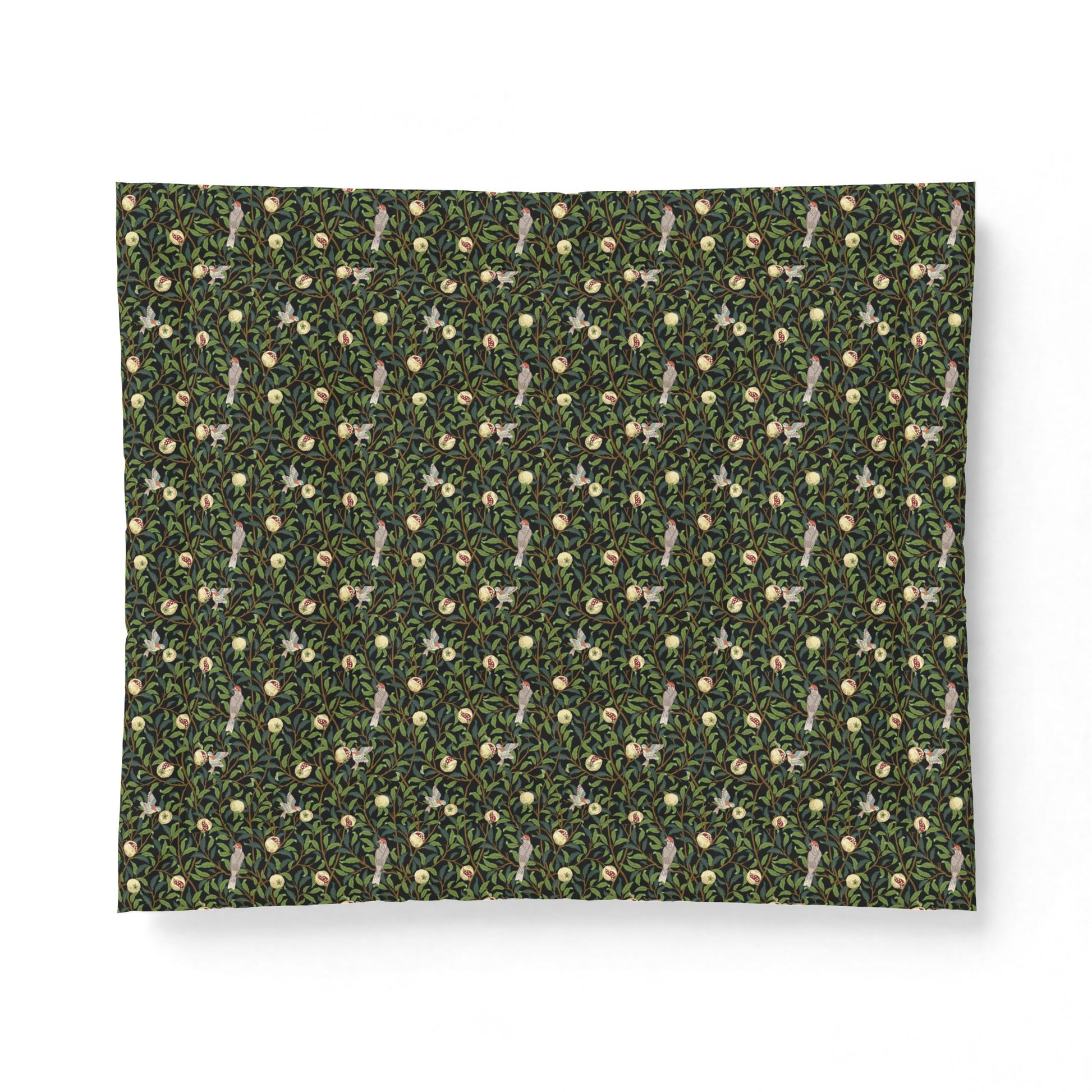 Patterned fabric with small animal design on a green background