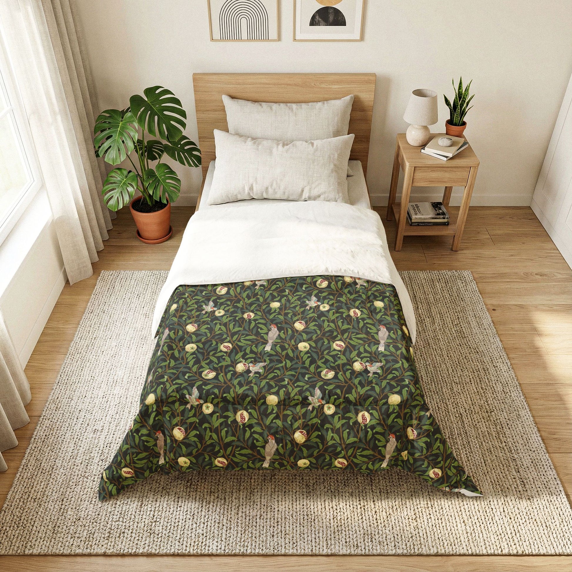 Bedroom with a bed featuring a green floral patterned duvet cover.