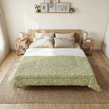 Bedroom with a bed featuring a green floral patterned comforter, wooden headboard, and side tables.