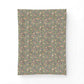 Floral patterned fabric swatch on a white background