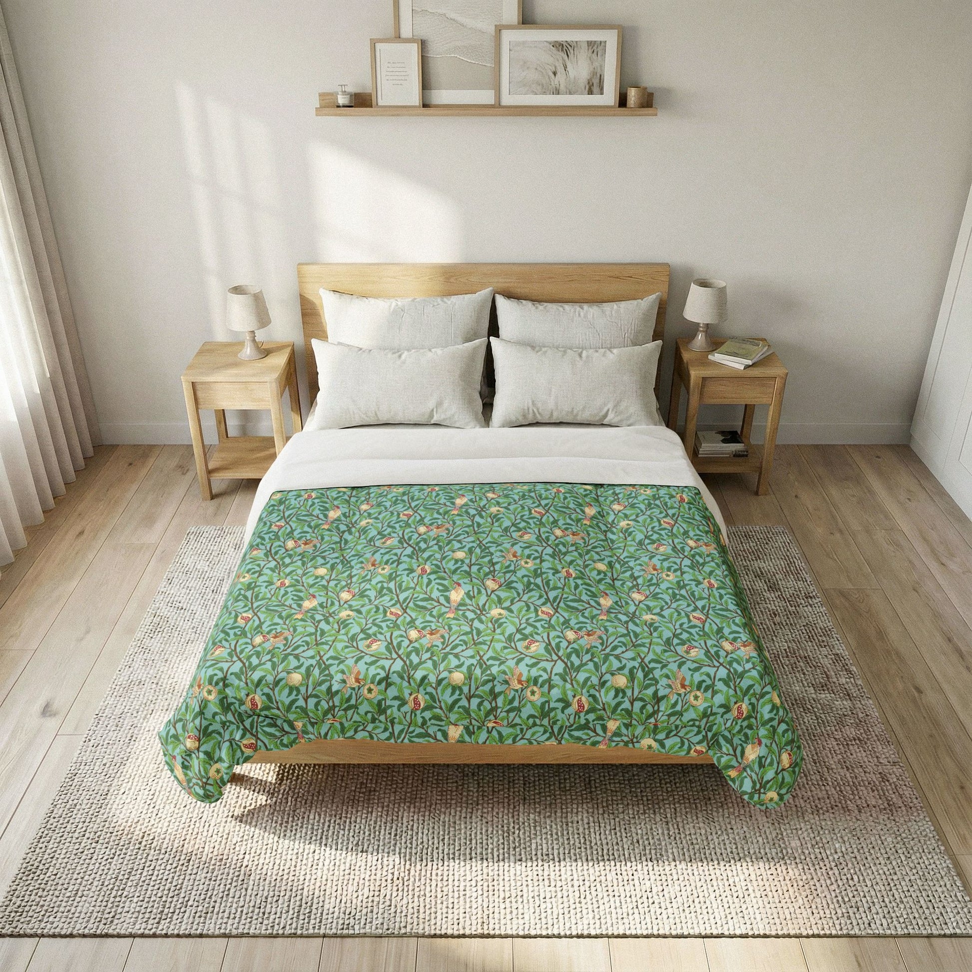 Bed with green floral comforter in a bright bedroom