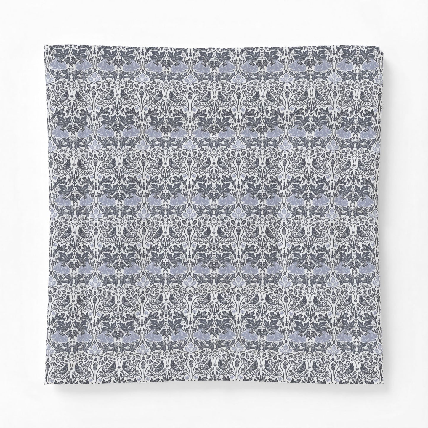 Floral patterned fabric swatch on a white background
