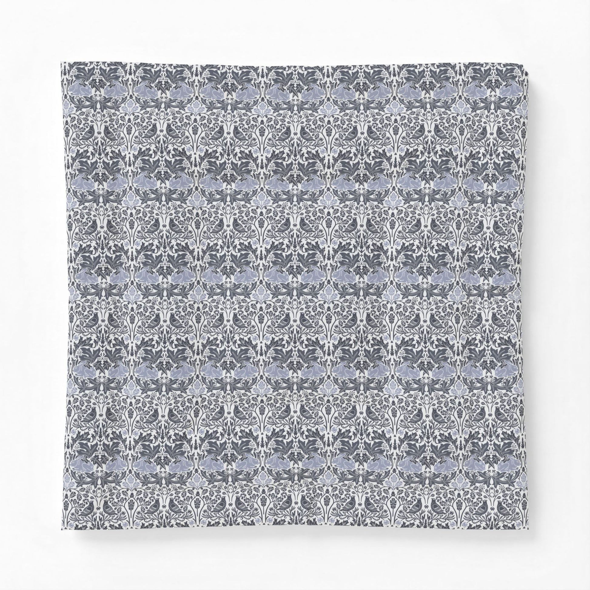 Floral patterned fabric swatch on a white background