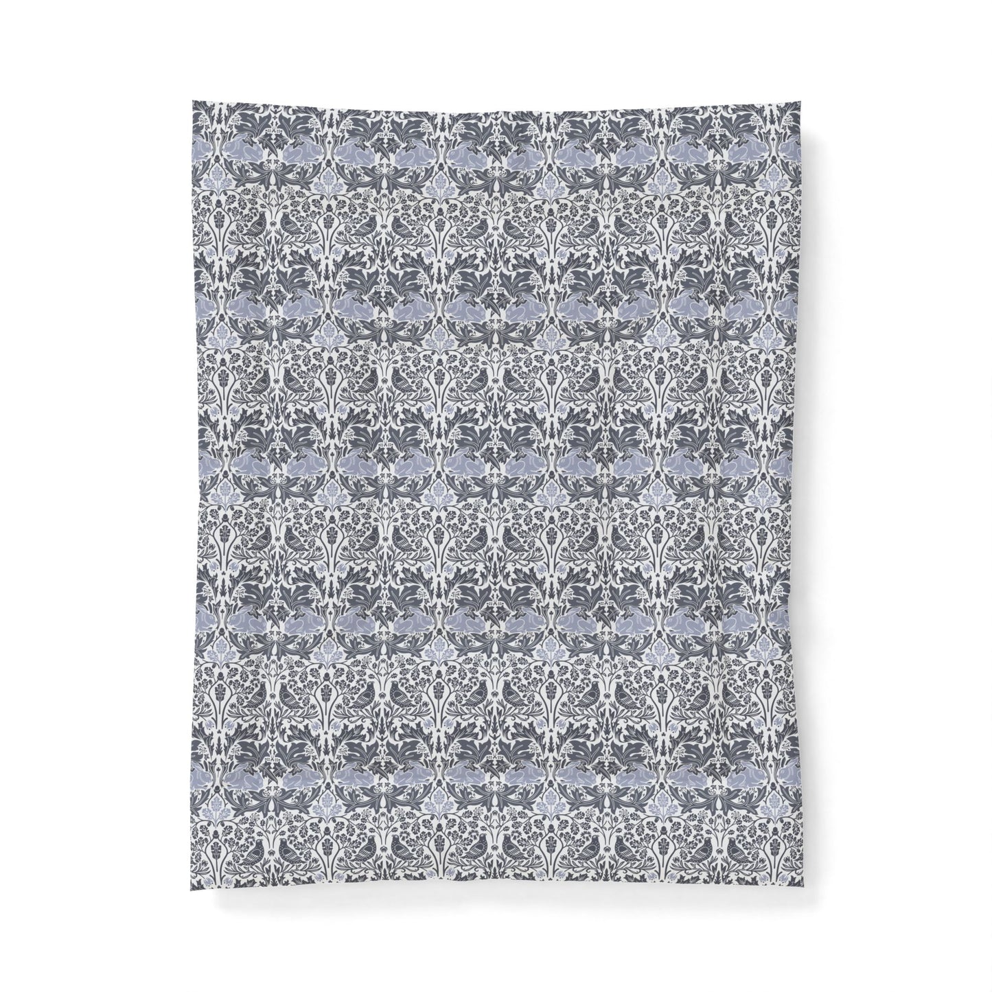 Patterned fabric swatch with a floral design on a white background