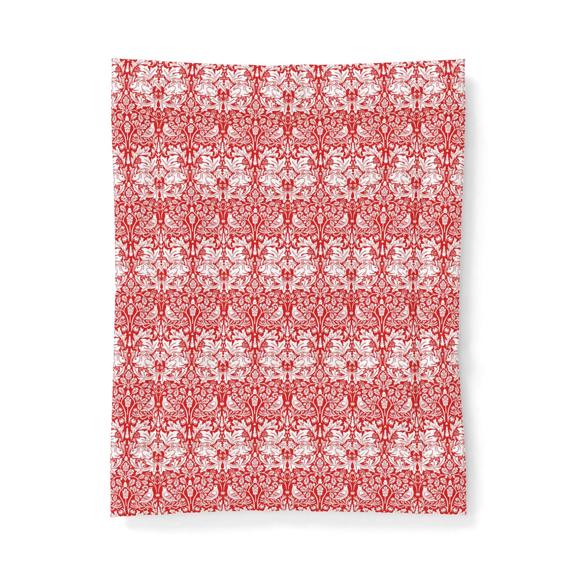 Red and white floral patterned paper on a white background