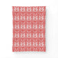 Red and white patterned fabric swatch on a white background
