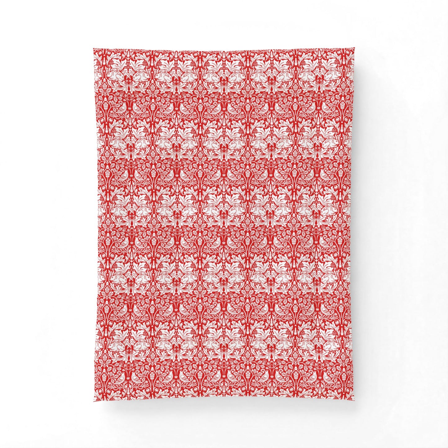 Red and white patterned fabric swatch on a white background