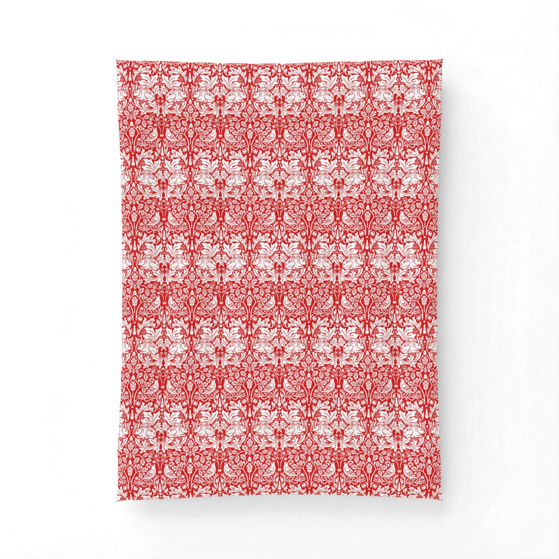 Red and white patterned fabric swatch on a white background