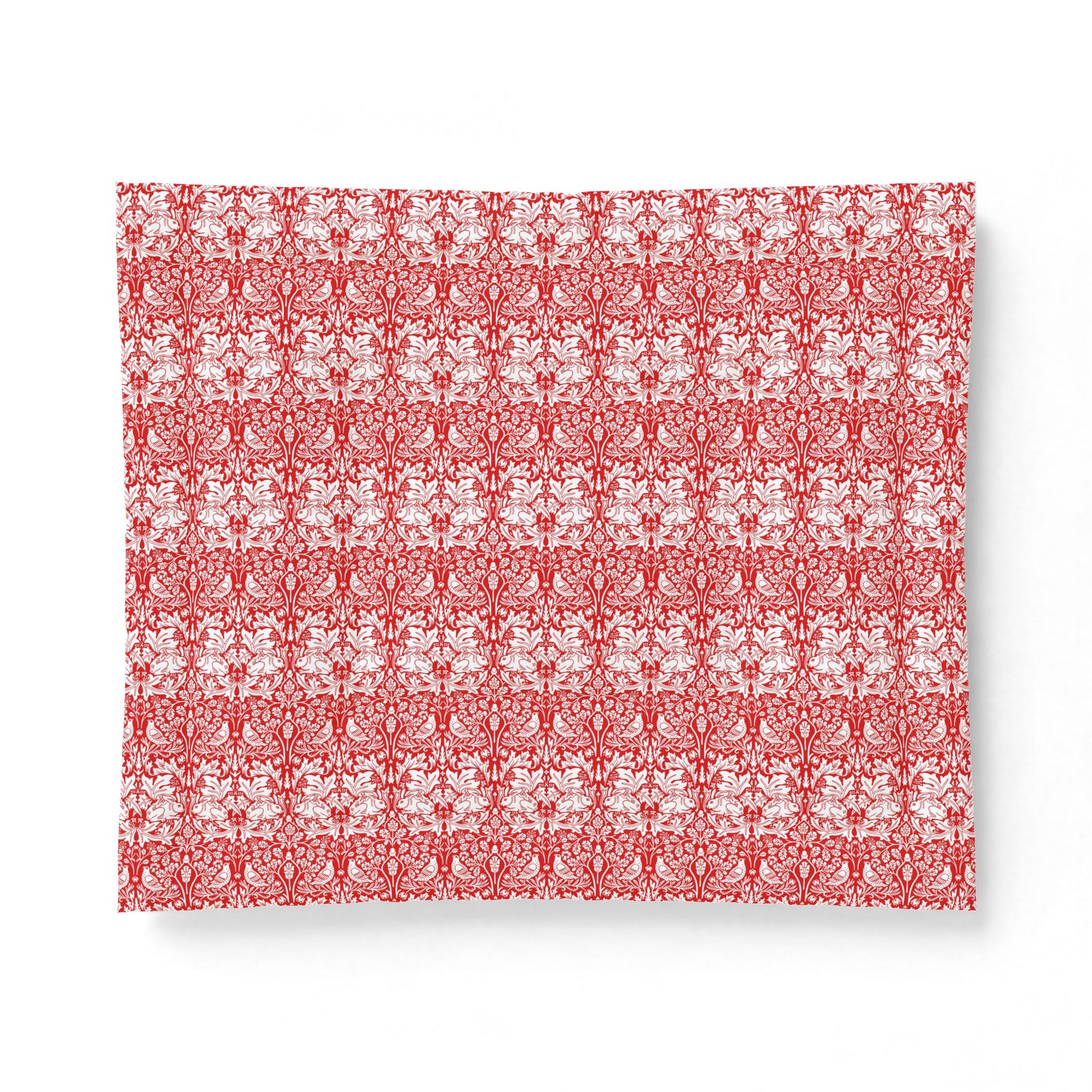 Red and white patterned fabric on a white background