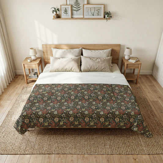 Bedroom with a bed featuring a floral-patterned comforter, wooden headboard, and side tables.