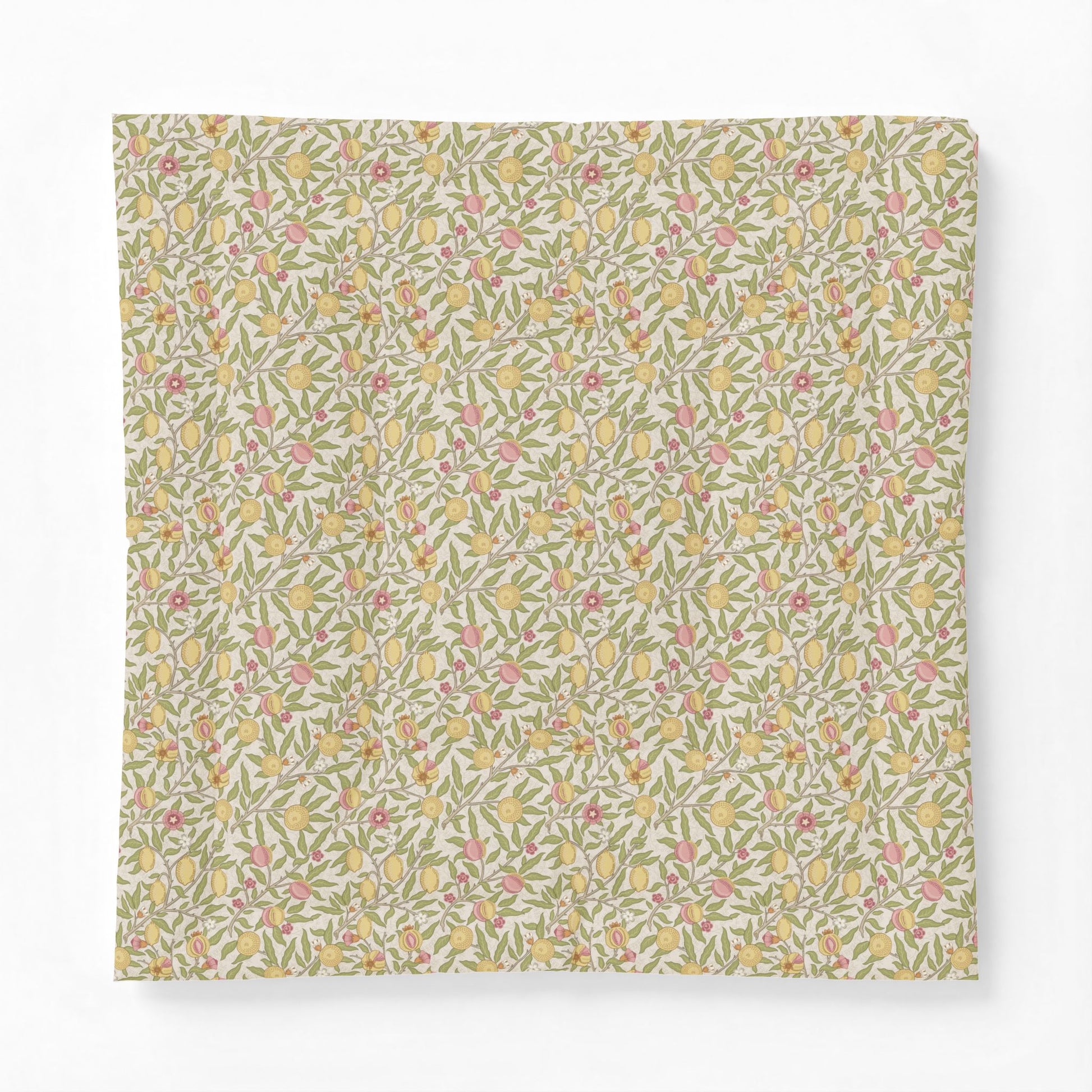 A square fabric or paper napkin featuring a dense, vintage-style floral and botanical pattern in muted yellow, pink, green, and beige tones, displayed flat against a clean white background.
