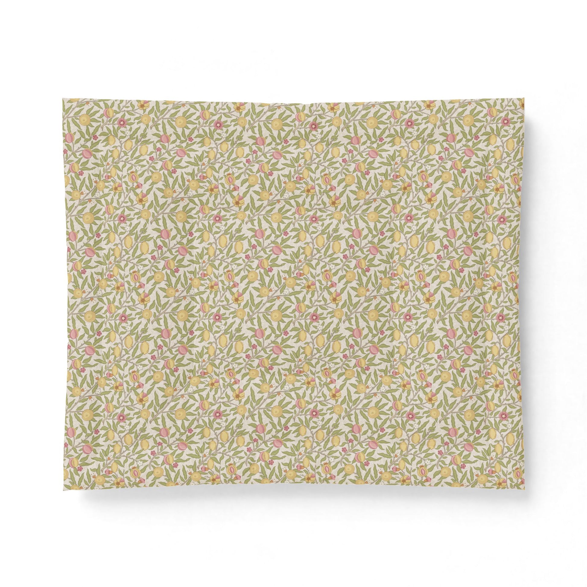 A square fabric or paper napkin featuring a dense, vintage-style floral and botanical pattern in muted yellow, pink, green, and beige tones, displayed flat against a clean white background.