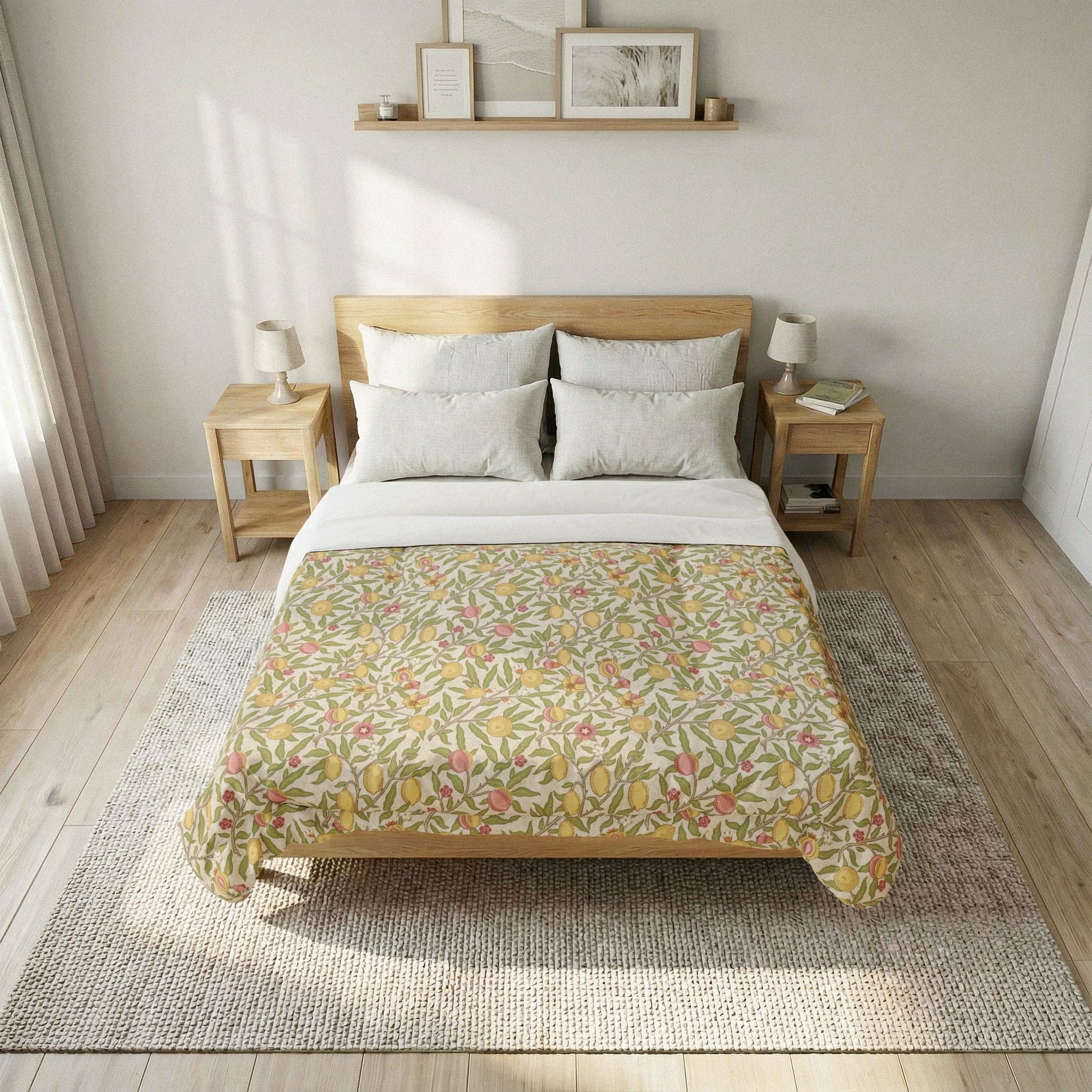 A neatly made bed in a bright, minimalist bedroom, featuring a floral-patterned quilt in yellow, green, and pink tones over white sheets and pillows, set on a textured neutral rug.
