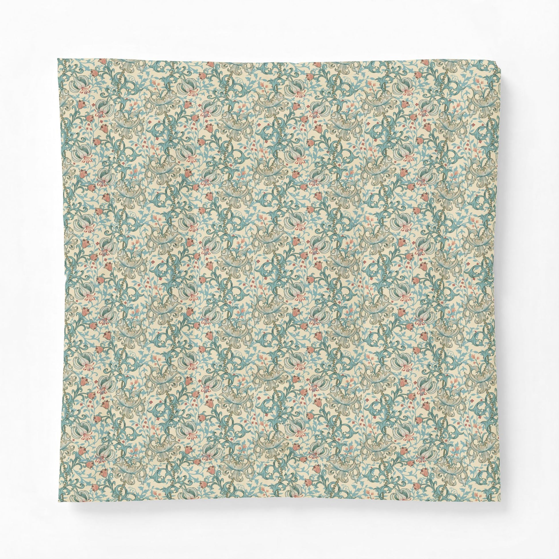 Cotton comforter from William Morris & Co featuring a dense vintage floral and botanical pattern in muted teal, sage green, dusty orange, and cream on a white background.